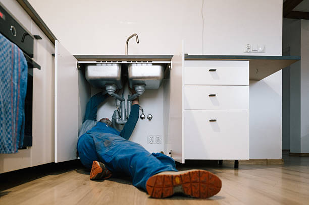 Professional Drain Cleaning technician working in Groton, MA